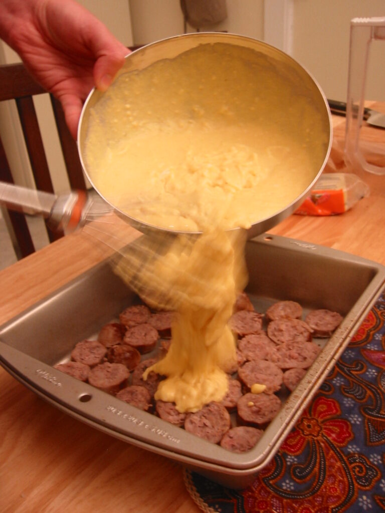 Dripping melted cheese on the sausage
